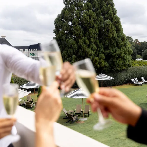 A group of people toasting with champagne glasses.