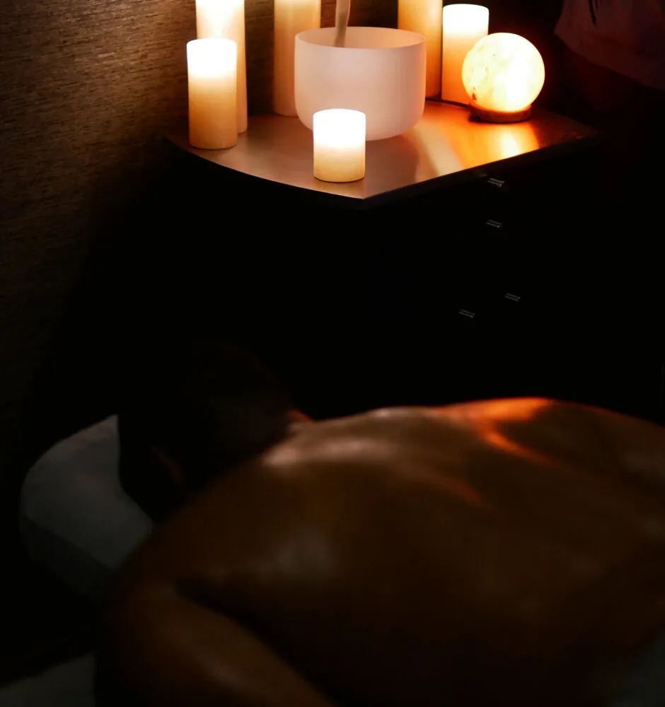 Spa room with candles creating a relaxing atmosphere