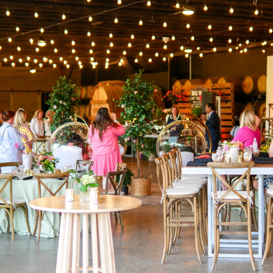 Guests enjoying drinks at outdoor event